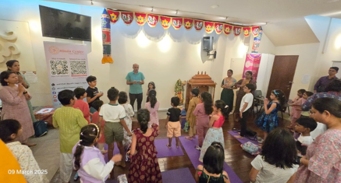 Balagurukulam children gathered in a circle for an in-person session, March 2025